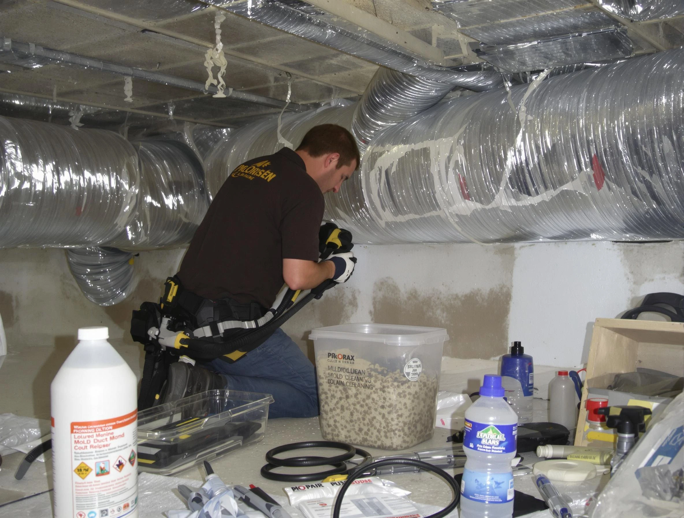 Sunset Air Duct Cleaning specialist performing professional mold removal from air ducts in Sunset